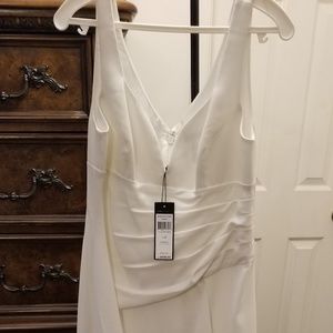 Off white bcbgmaxazria dress with slit.